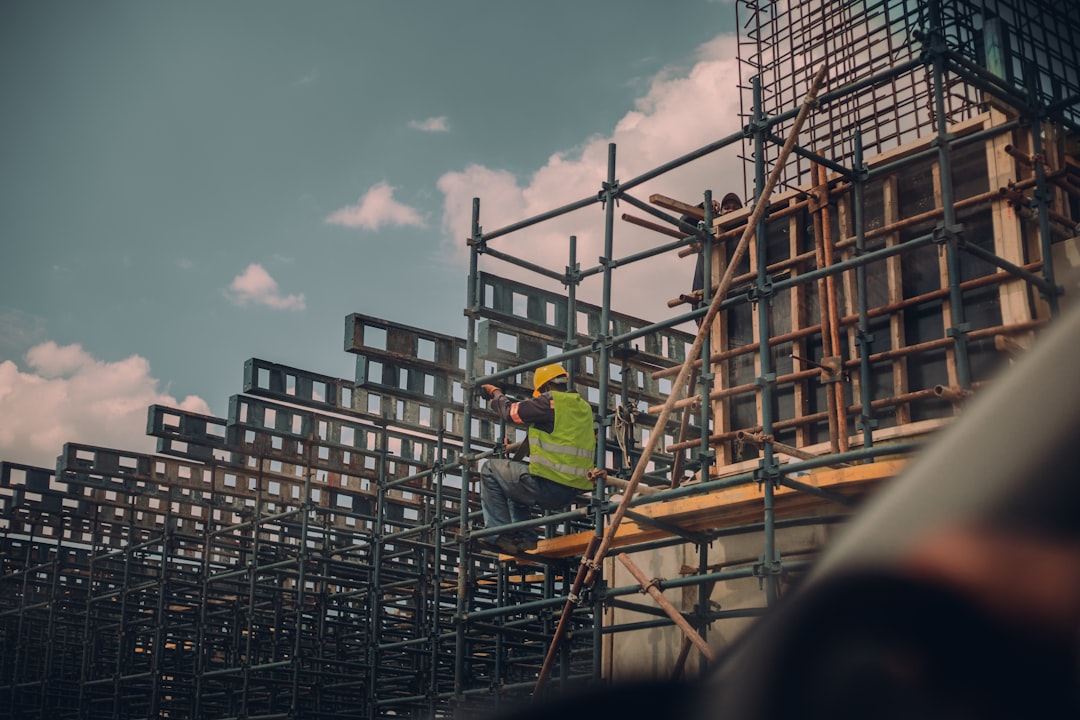 Engineer reviewing construction blueprints